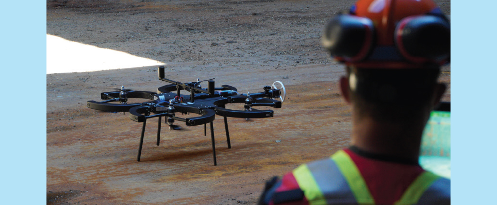 A Skyguage Robotics drone performing an inspection on a ship. 