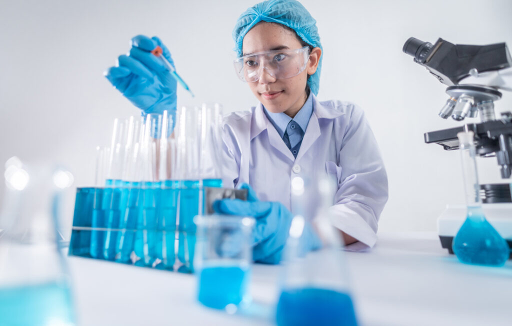 Female scientist working with test tubes