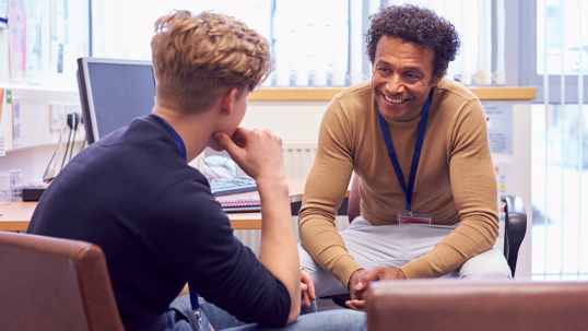 friendly advisor helping male student