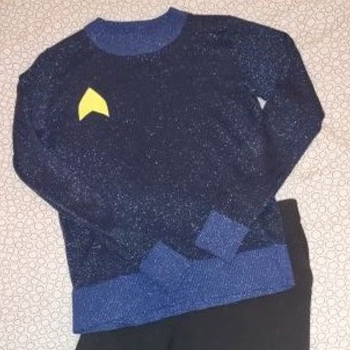 Star Trek costume on a bed