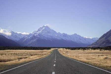 A straight Road with Mountains