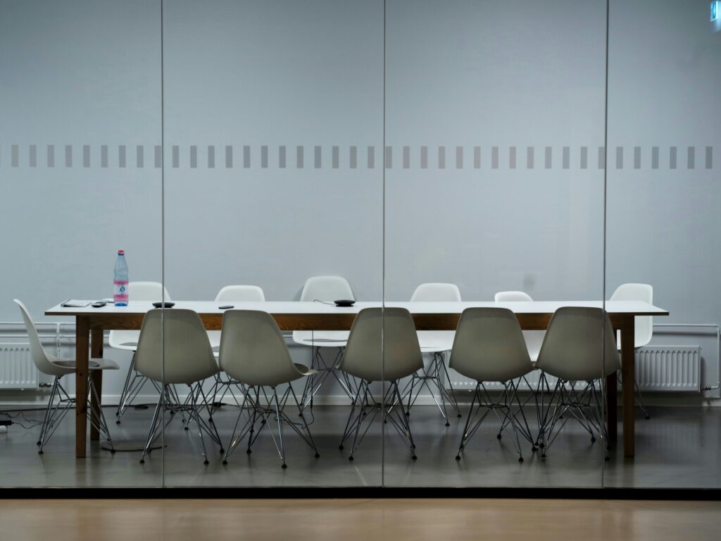 A photo of a meeting room. Photo by Pawel Chu on Unsplash.