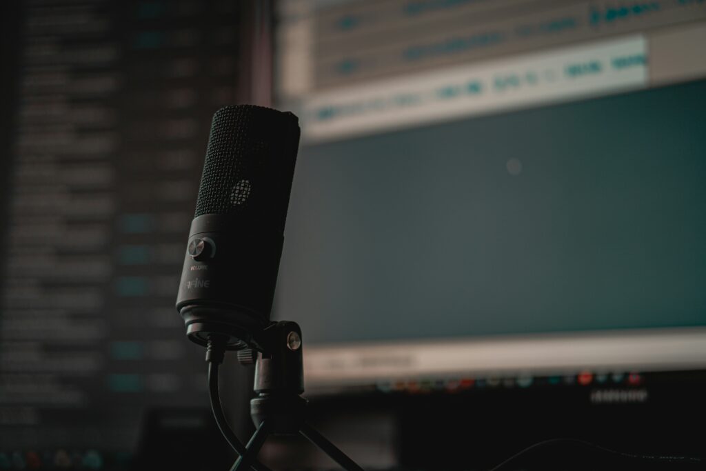 Photo of an up close all black microphone. Photo: Cedrik Wesche on Unsplash.