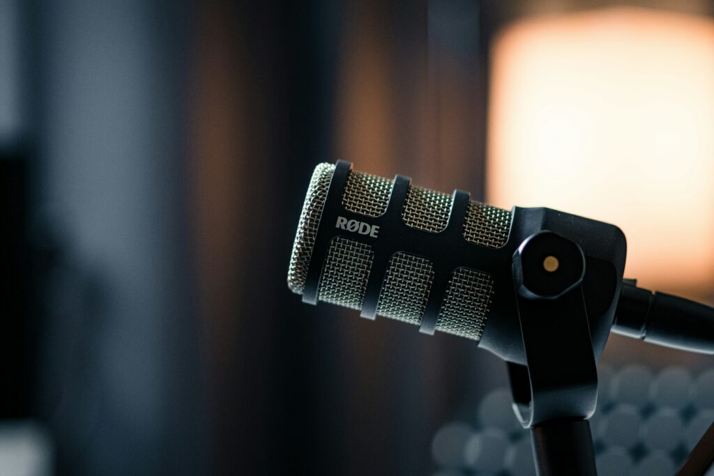 Photo of a black and silver RODE brand microphone. Photo: dlxmedia.hu on Unsplash.