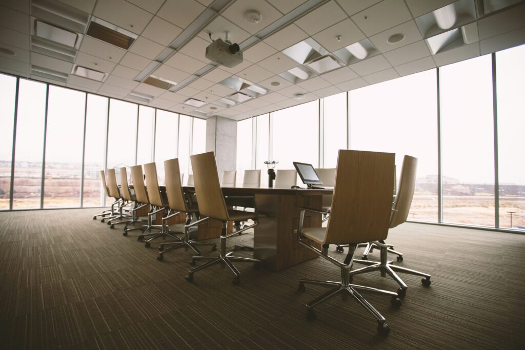 A photo of a meeting room. Photo is by Benjamin Child on Unsplash.