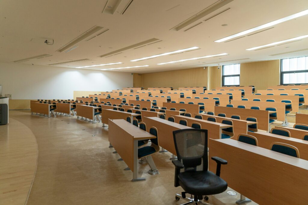 Chairs in a lecture hall. Photo: Changbok Ko on Unsplash.