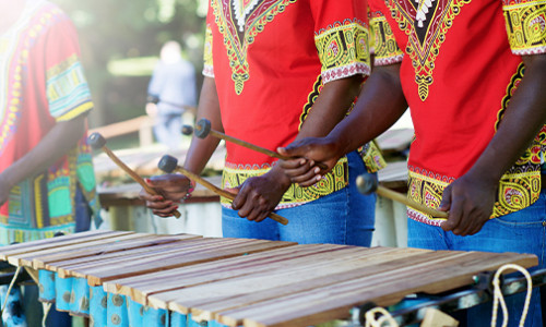 african drummers in traditional clothes