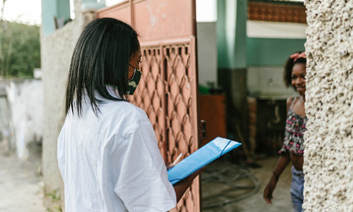 medical worker greeting person
