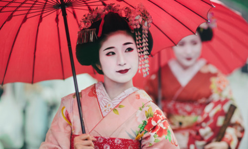 east asian women in traditional japanese attire