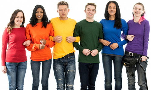 group of diverse people in pride coloured sweaters