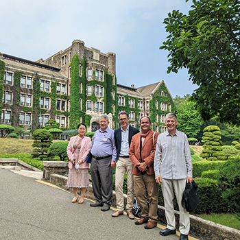 Group of writers standing in front of Yonsei University