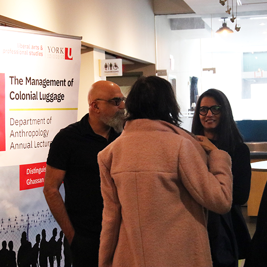 Attendees mingling during welcome reception.