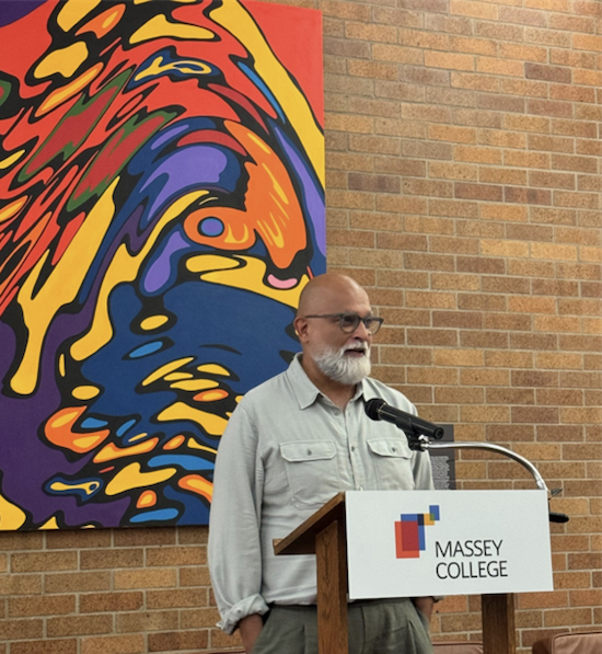 A photo of Professor Zulfikar Hirji speaking at Massey College