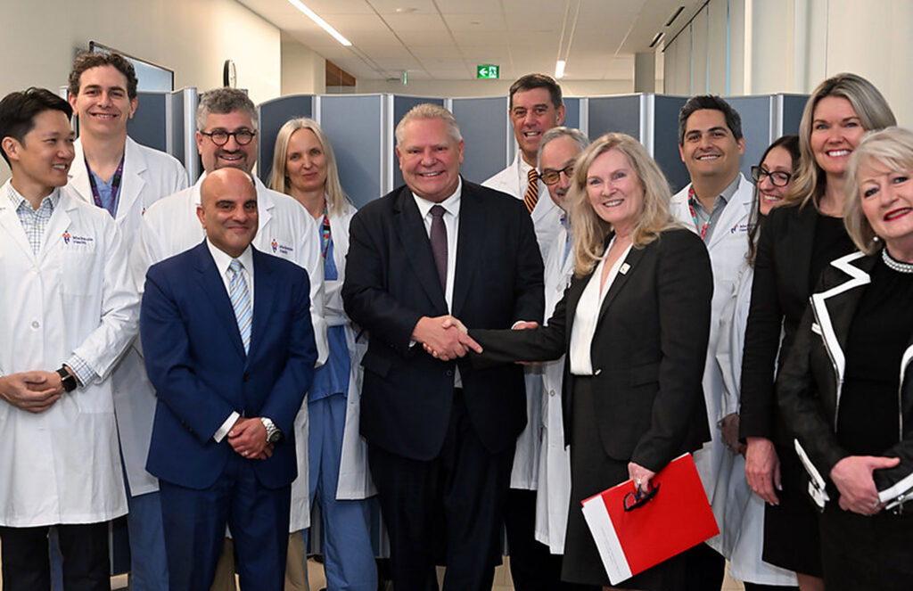 President Rhonda Lenton shaking hands with Premier Doug Ford.