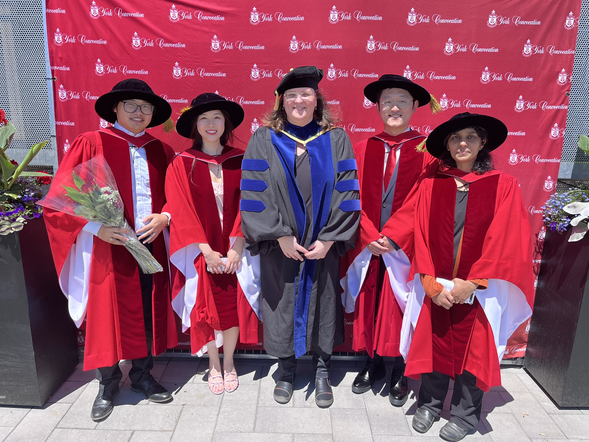 Photo of The Chair of Chemistry Dr. van Wijngaarden and 4 PhD Students at the June 2024 Convocation Ceremony