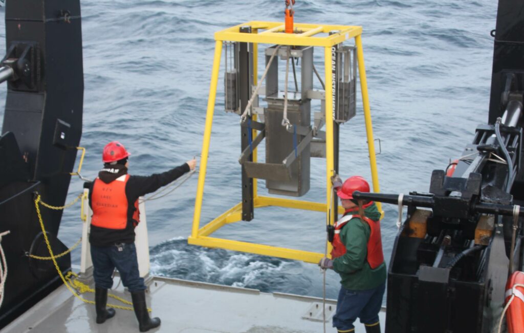 Retrieval of the box corer containing Lake Erie sediments, from which the sediment cores were retrieved for this study. Photo courtesy of Euan Reavie and Dmitri Perlov