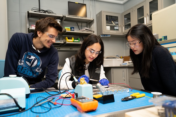 students working on a science project