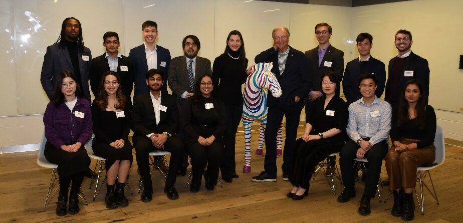 Introducing the 2022 Lassonde Scholarship Recipients On Monday, March 6, Lassonde welcomed the 2022 cohort of Lassonde Scholars to celebrate their accomplishments at the Lassonde Scholars Reception. The newest recipients of the Lassonde Scholarship were joined by Pierre and Julie Lassonde of the Lassonde Family Foundation and Dean Jane Goodyer. Pierre and Julie Lassonde posing with a group of Lassonde Scholars. Left to right: Julie Lassonde, Pierre Lassonde, Misheel Tuguldur, Yisroel Rosenberg, Lucas Chua, and Dominique Wanandi. Pierre Lassonde posing with Lassonde Scholar Glendon Stewart and his guests. These students join a community of over 100 Lassonde Scholars who demonstrate academic excellence, creative thinking and community leadership. “Through their extracurricular activities, research, entrepreneurial endeavours, and community leadership, our Lassonde Scholars are an inspiration to others both within Lassonde and in the broader community,” says Jane Goodyer, Dean of the Lassonde School of Engineering. Dean Jane Goodyer Through the Lassonde Scholarship, the Lassonde Family Foundation is supporting Lassonde’s work in empowering diverse creators to make a positive impact. This generous financial support reduces barriers to post-secondary STEM education completion, helping ensure the next generation of engineers and scientists are part of a more equitable, diverse and inclusive STEM environment. “The community of Scholars that Mr. Lassonde has built here is one that I am proud to call family and one that I’m proud to be a member of,” says Yisroel Rosenberg, Lassonde Scholar and third-year Civil Engineering student. “The students and faculty at Lassonde are consistently looking out for one another no matter the discipline one is studying.” Yisroel Rosenberg sharing remarks at the Lassonde Scholars Reception. Lassonde is proud to welcome the fourteen newest Lassonde Scholarship recipients of 2022. You can learn more about each of them below: Shahen Alexanian is a third-year computer science student. During his time at Lassonde, he has been a PASS leader and mentor in the Computational Thinking Club. Alexanian hopes his future career involves collaborating with others to solve challenging problems. Jatin Chhabra is an international student in his third year of Mechanical Engineering. He has worked as an undergraduate researcher in machine learning as part of the LURA program and strives to be a changemaker and community leader. Luca Chua is in his final year of the Electrical Engineering program and is also completing the BEST program. Chua is currently working on a capstone project that uses machine learning and Wi-Fi to help the elderly and people with disabilities gain more independence through smart home devices. Shannon Fernando is studying Atmospheric Science and completing a certificate in Meteorology. She hopes to pursue new media journalism and is currently working at the Weather Network as part of a video meteorologist internship. Connor Humphries is a third-year Space Engineering student. He is hoping to focus his studies on space debris and space architecture. Through research opportunities, events, and involvement with the York University Robotics Society, Humphries hopes to gain expertise and experience within these fields. Kiet Le is a Computer Engineering student with a passion for learning. Community involvement is important to Le, and he has been active in the Lassonde Engineering Society (LES) in addition to his studies. Through his work with LES, Le is creating opportunities for students to learn and network. Wan Ning Ma is a first-year Computer Science student aspiring to a career in machine learning. As the first-year representative of the Computing Students Hub, she is committed to helping her peers navigate the transition into post-secondary education. She also gives back to the community through her work as an interpreter and translator for families seeking refugee protection in Canada. Pratish Patel is an international third-year Mechanical Engineering student. Patel would like to pursue a career in aerodynamics and aviation. He is also a member of the Lassonde Motorsports team and has participated in many Lassonde Engineering Society events. Yisroel Rosenberg is a third-year Civil Engineering student. He aims to inspire other students at Lassonde through his role as co-president of the Civil Engineers of Lassonde club. Rosenberg hopes to pursue a master’s degree in environmental engineering so that he can help design global sustainable systems. Fatema Roshni is a Mechanical Engineering student with the aspiration of starting a small business. She is involved with several clubs at York University, has taken part in mentorship programs and is teaching herself coding to better integrate software with machines. Glendon Stewart is a first-year Computer Engineering student. He is currently working on a project to outfit a compressor tank that is a part of an air suspension in cars with a water sensor and Arduino. Stewart hopes to pursue his master's degree in computer engineering and focus his career in the automotive and electric vehicles sector. Misheel Tuguldur is a first-year Computer Science student who is passionate about inspiring women in STEM. She is an active member of the Lassonde community and is focused on volunteering, getting involved with student clubs and assisting others as a peer helper. Kristin Villena is in her first year studying Computer Science. She aims to become a computer science educator after her positive experience volunteering as a student-teacher. Her passion for teaching and learning motivated her to become a class representative at Lassonde. Dominique Wanandi is an international student in his second year of Civil Engineering. He is committed to using his skills to improve Lassonde and has gotten involved in the Civil Engineering Society. Wanandi is interested in project management and strives to lead by example. 2022 Lassonde Scholars with Pierre and Julie Lassonde