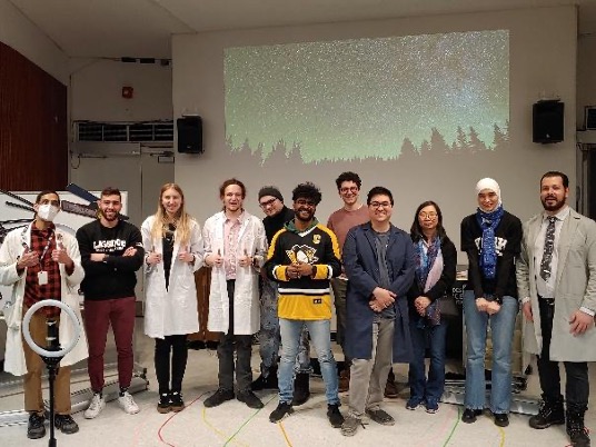 Professor Lee and her students posing at the Ontario Science Centre