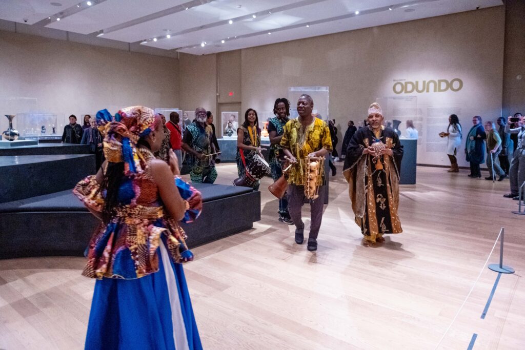 Collette Murray leading the dance procession through the Gardiner Museum