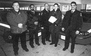 Phyllis Clark (second from right) with staff members (from left) Dragan Spasojevic, Muhammad Aleem, Shane Budgell and Dan Welk in the York Lanes Parking Garage