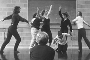 Students at improvisational dance workshop as host Professor Mary-Elizabeth Manley looks on