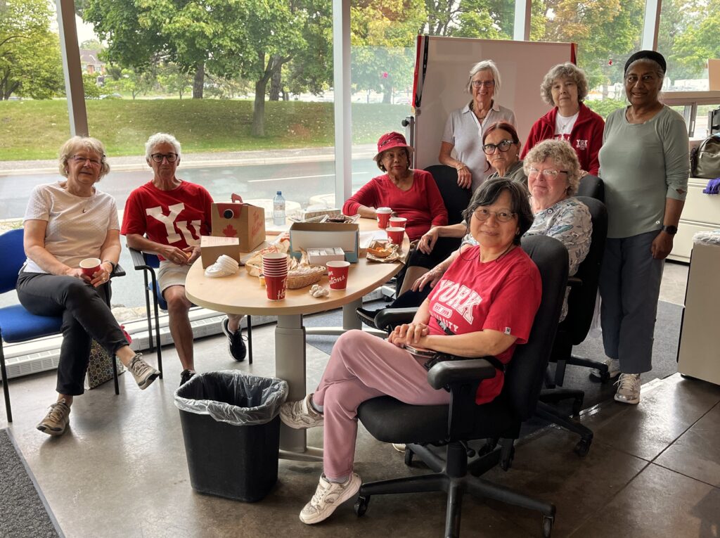 Members of the group relax in the YURA office following the walk.  Clockwise from left, Diane Woody, Sheila Forshaw, Agnes Fraser, Gwyn Buck, Debbie Hansen, Marla Chodak, Amina Hussain, Jane Grant and Grace Chui.